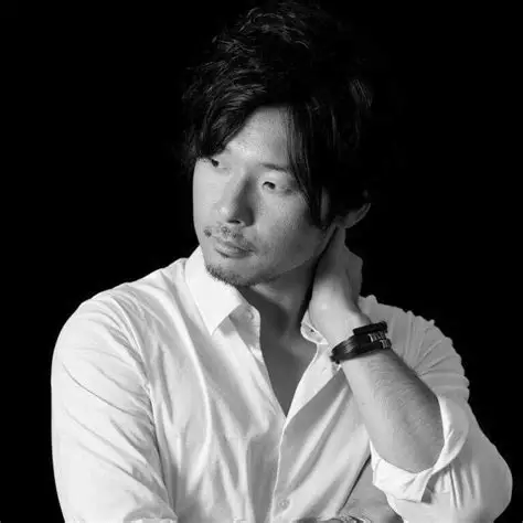 Yuta Wakayama, QUEST CEO & Founder, elegant modern headshot